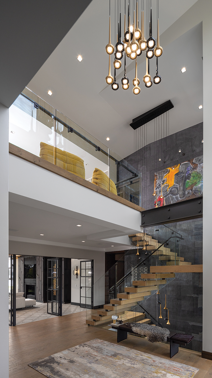 Northern Staircase Co., in Pontiac, worked with the design team to create a beautiful stairway. 